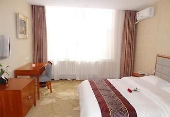 Yuangu Town Business Hotel Qingdao Buitenkant foto