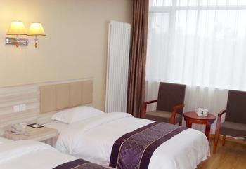 Yuangu Town Business Hotel Qingdao Buitenkant foto