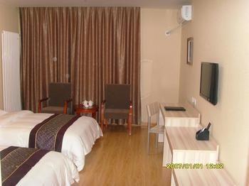 Yuangu Town Business Hotel Qingdao Buitenkant foto